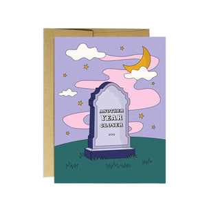Colorful birthday card with image of gravestone that says "another year closer"