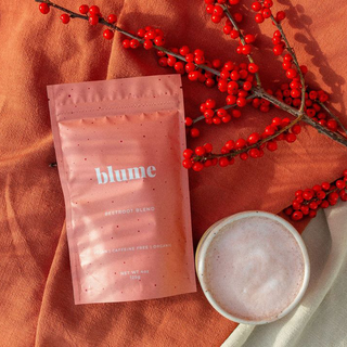 A pink package of blume beetroot blend with product information printed on it.
