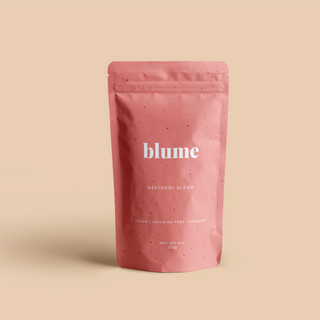 A pink package of blume beetroot blend with product information printed on it.
