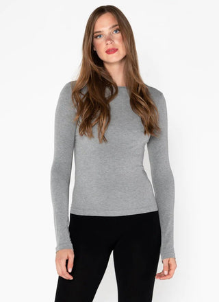 Woman wearing a grey crewneck top made of bamboo