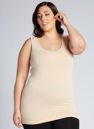 A woman wearing a Bamboo Curvy Classic Tank Top with thick straps and a scoop neckline.