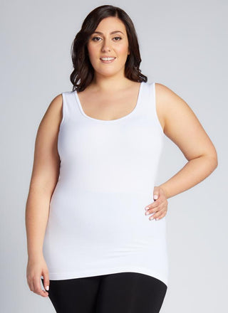 A woman wearing a Bamboo Curvy Classic Tank Top with thick straps and a scoop neckline.
