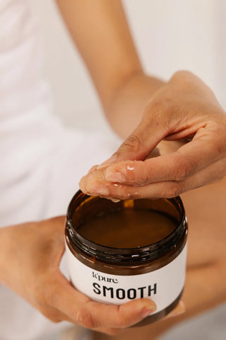 women using the k'pure sugar scrub