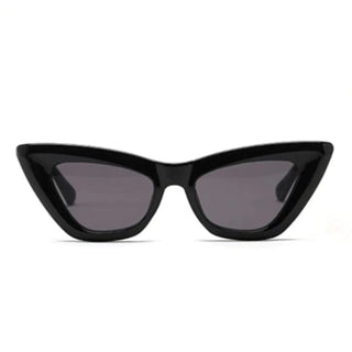 black cat eye shaped sunglasses on a white background
