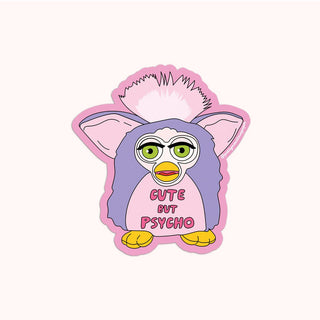 A sticker with a illustration of a white cat with a bow, and the text 'cute but psycho"
