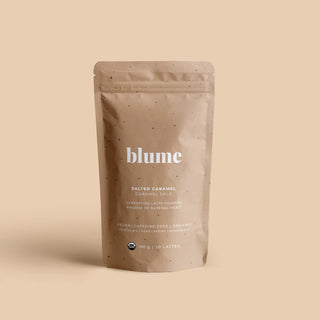 Blume product packaging with two glasses of iced coffee on a light background