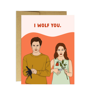 Card with two cartoon characters on it with text saying I Wolf You. 