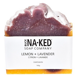 Handmade bar of soap with a purple to orange gradient, branded as Buck Naked Soap Company, Lemon + Lavender