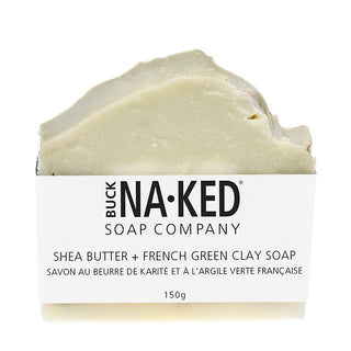 Bar of soap with a label from the Buck Naked Soap Company on a white background