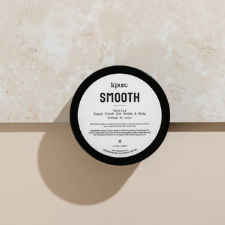 Kpure Smooth Vanilla Sugar Scrub container on a beige background
