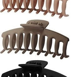a plastic claw clip in a brown colour